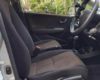 Interior of a Honda Fit Shuttle Hybrid Station Wagon with hand controls for hire