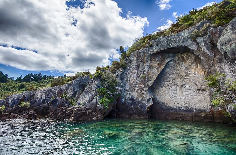 new zealand mural maori rock - Maori Rock Carvings Cruises