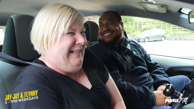 Freedom Mobility driving instructor shows Jay Jay Feeney of More FM how to drive a hand control car.