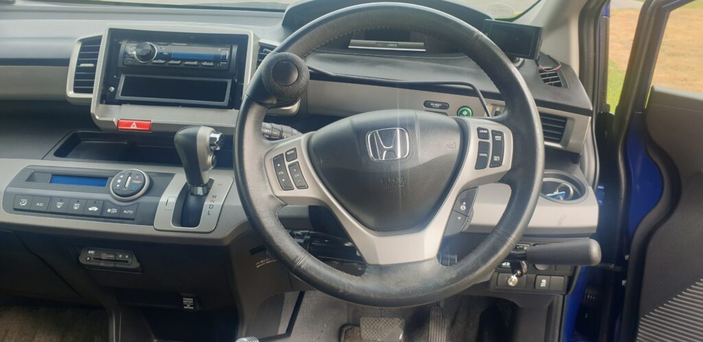 Honda Freed Hybrid with Hand Controls wheel